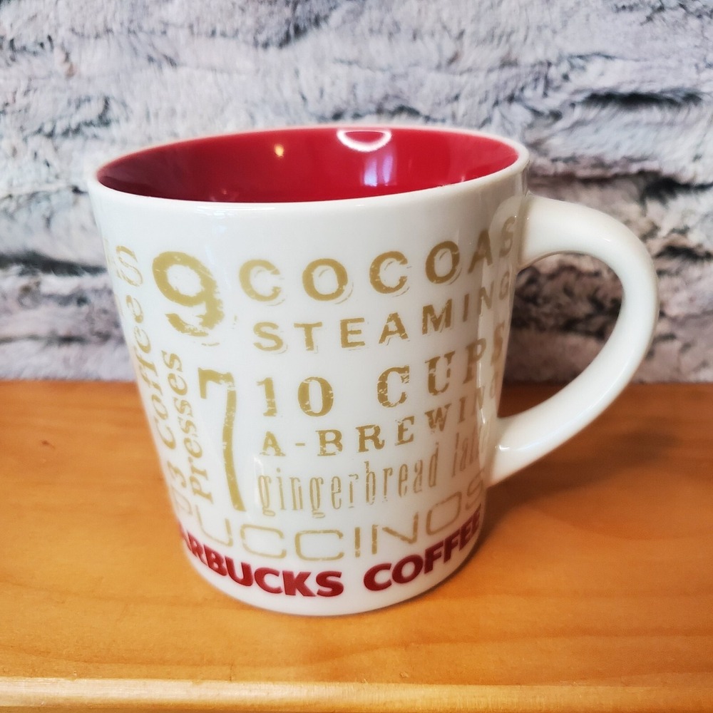 14 Oz STARBUCKS 12 Days‎ of Christmas Coffee Mug EUC Gold Words Red Interior Cup